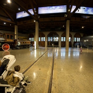 Historic Train Museum Interior with Classic Locomotives on Display