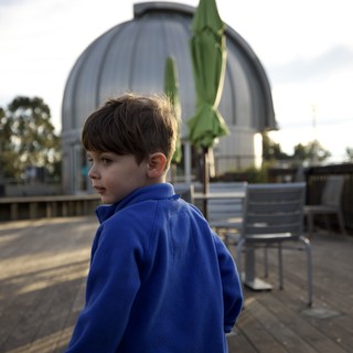 Young Boy at Observatory Deck at Dusk