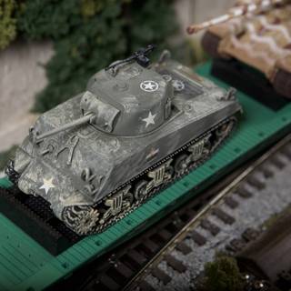 Military Tank on Train Track