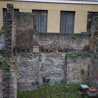 Preserved War Ruins Behind Modern London Architecture