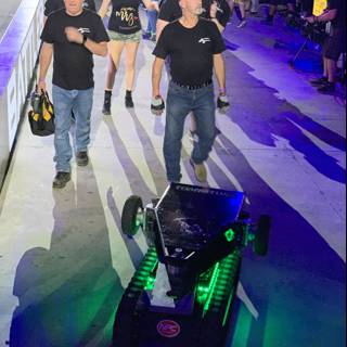 Man walks with robot on Las Vegas stage