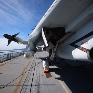 Military Fighter Jet on Aircraft Carrier Deck