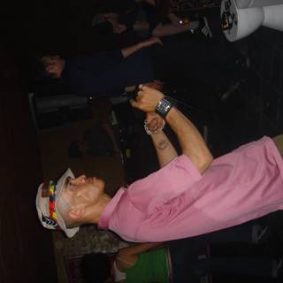 Pink Shirted Man at the Club