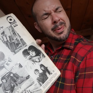 Man Reading Vintage Music Magazine in Flannel