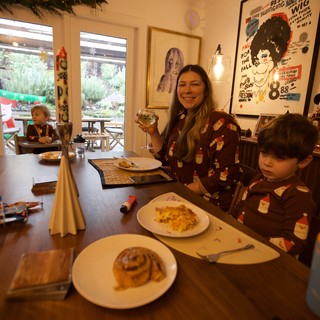 Christmas Family Dinner at Home with Matching Pajamas