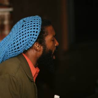 Singing Man with Blue Beanie and Beard