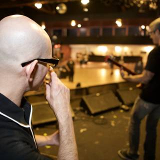 Bald Man Rocks Out at Bad Religion Concert