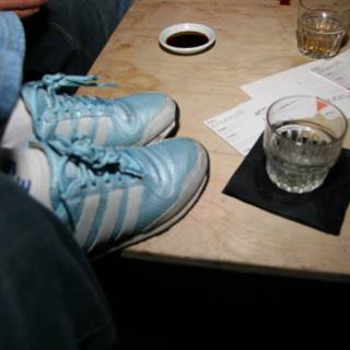 Blue shoes on table