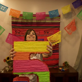 Penelope Celebrates with Colorful Number Five Piñata