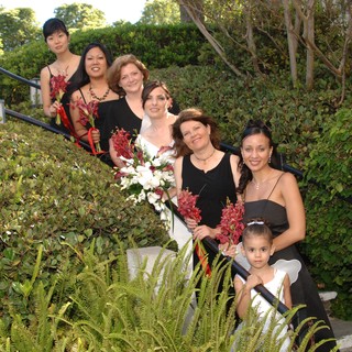 Bridal Party Poses on Garden Staircase at Wedding