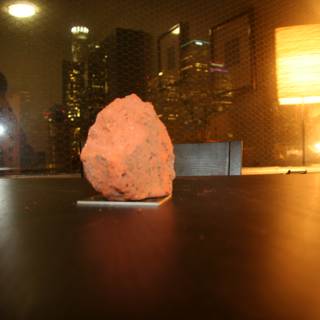 The Rock on the Wooden Table by the Window