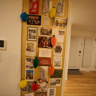 Holiday Card Display Wall with Festive Decorations