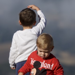 adventurous-and-candid-with-a-hint-of-dramatic-tension-from-the-stormy-sky