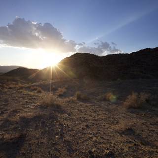 Desert Sunset with Mountain Flare
