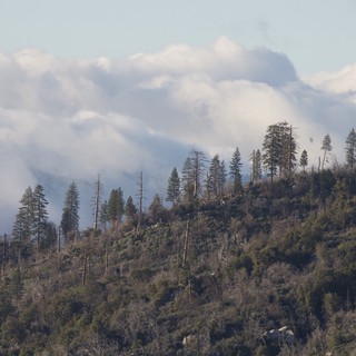 Mountain Ridge Through Smoke and Clouds Above Yosemite