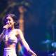 Jhené Aiko Solo Performance Caption: Entertainer Jhené Aiko electrifying the crowd with her powerful voice during a solo performance at Coachella 2014.