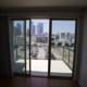 Cityscape through an Open Window