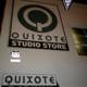 Quixote Studio Store Sign at Night