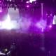 Purple Spotlight on the Rock Concert Crowd