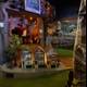 Miniature Golf Course with Fake House and Spider at Urban Putt