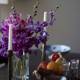 Elegant Purple Flower Arrangement with Candles