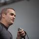 Henry Rollins Takes the Stage with Microphone in Hand