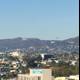 Hollywood Sign and Urban Skyline Captured from High Rise
