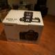 Unpacking the Canon EOS 5D Mark II in a Wooden Container