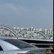 Urban Solitude: A Serene Moment on Seoul's Bridge