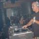 Black-Shirted DJ Setting the Beat