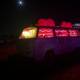 Neon Van Glowing Under the Night Sky