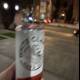 Enjoying a Tin of Beer on the Street
