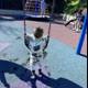 Joyful Swing at the Playground