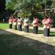 Traditional Hula Performance in a Flower Garden
