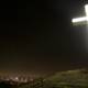 Illuminated Cross on Hilltop