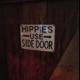 Hippies Know the Way: Wooden Sign Leads the Path
