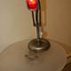 The Red Lamp on the Wooden Table