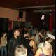 Nightclub party-goers groove to the music