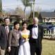 Wedding Party Poses in Front of Vintage Cars