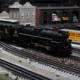 Miniature Train on Railroad Track