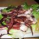 Octopus on a Plate with Lettuce and Lemon