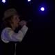 Beck Performs Solo Set in Fedora and Vest