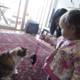Little Girl and Her Feline Friend