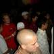 Bald-Headed Man Draws a Crowd at Nightclub