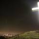 Illuminated Cross Atop the Hill