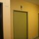 Three Doors and a Switch in a Hallway