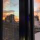 Metropolis Sunset from High Rise Window