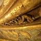 Golden Carvings Illuminating the Temple Ceiling