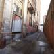 Graffiti-Lined Urban Alleyway