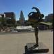 Skateboard Statue in Urban Metropolis